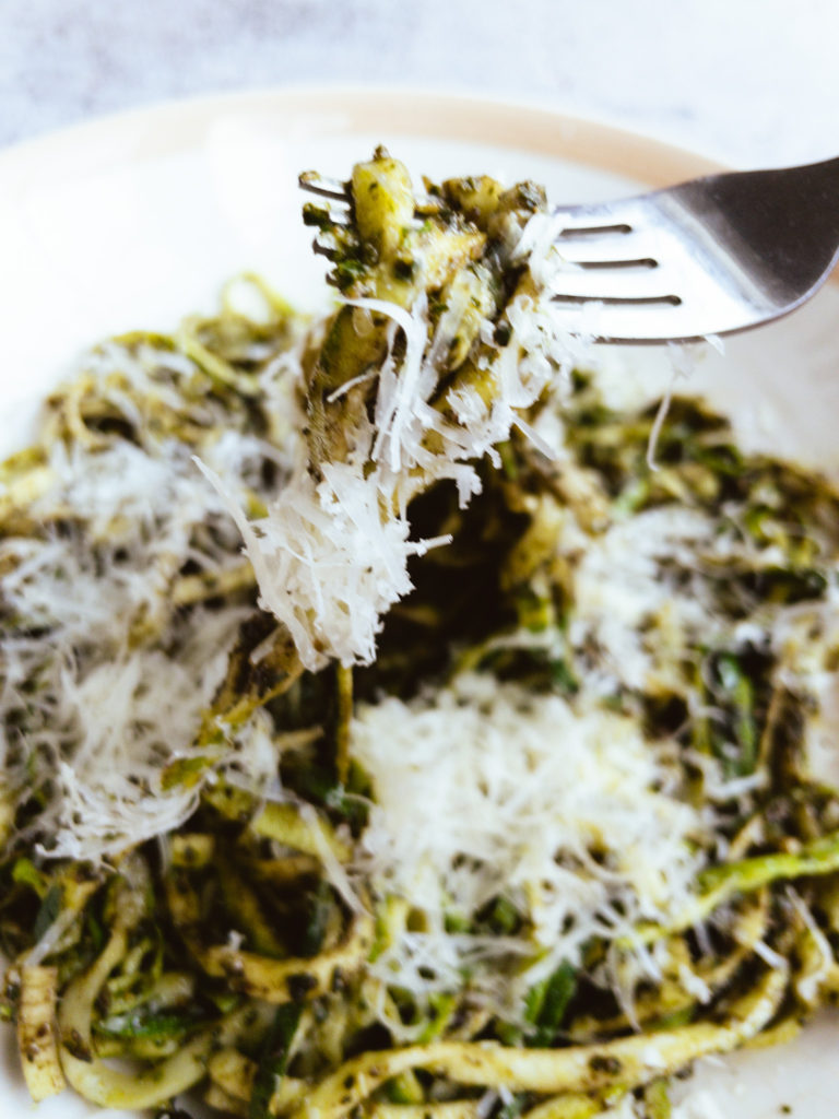 Pesto noodles on a fork